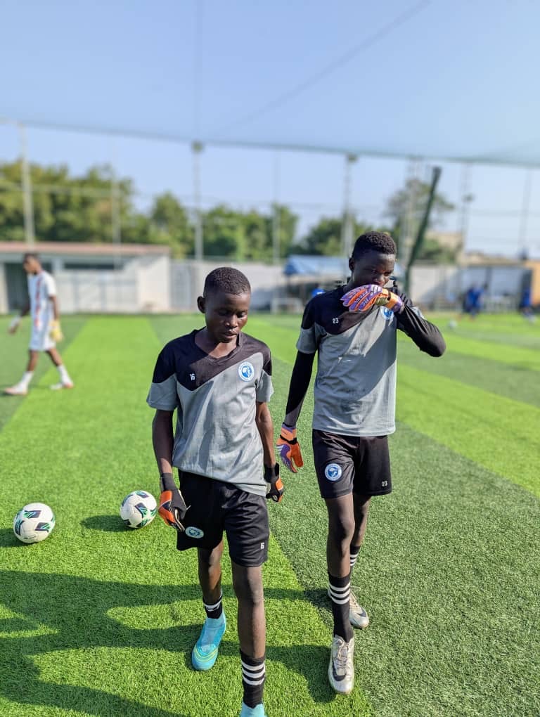 Goalkeepers walking together