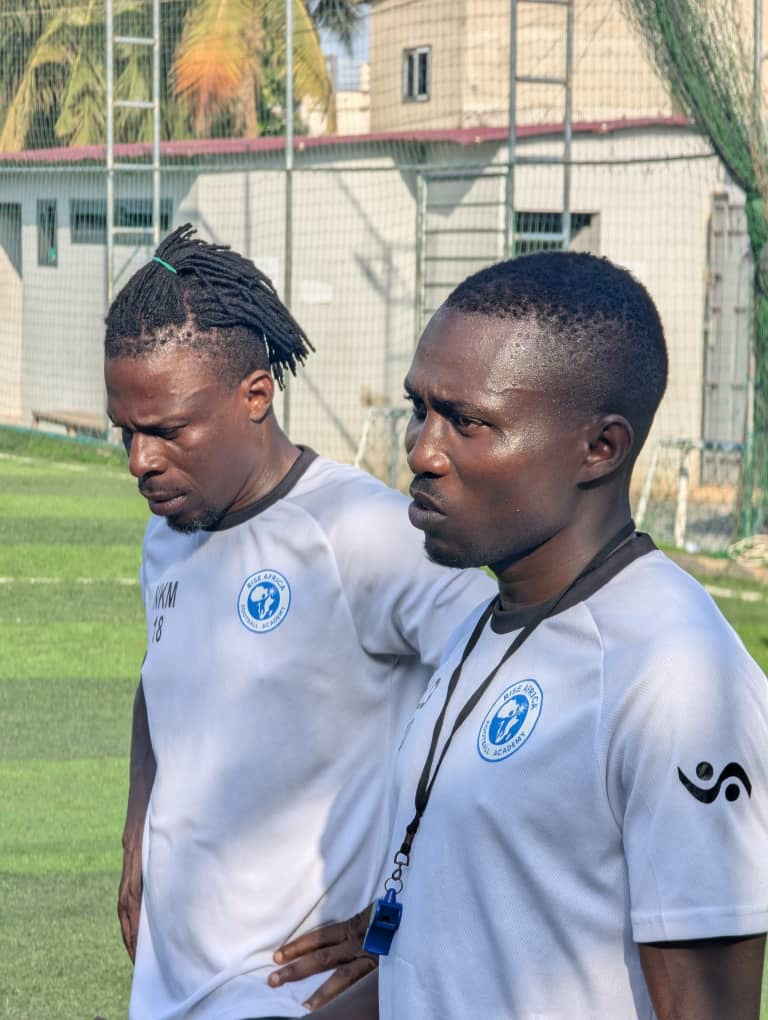 Coaches watching training