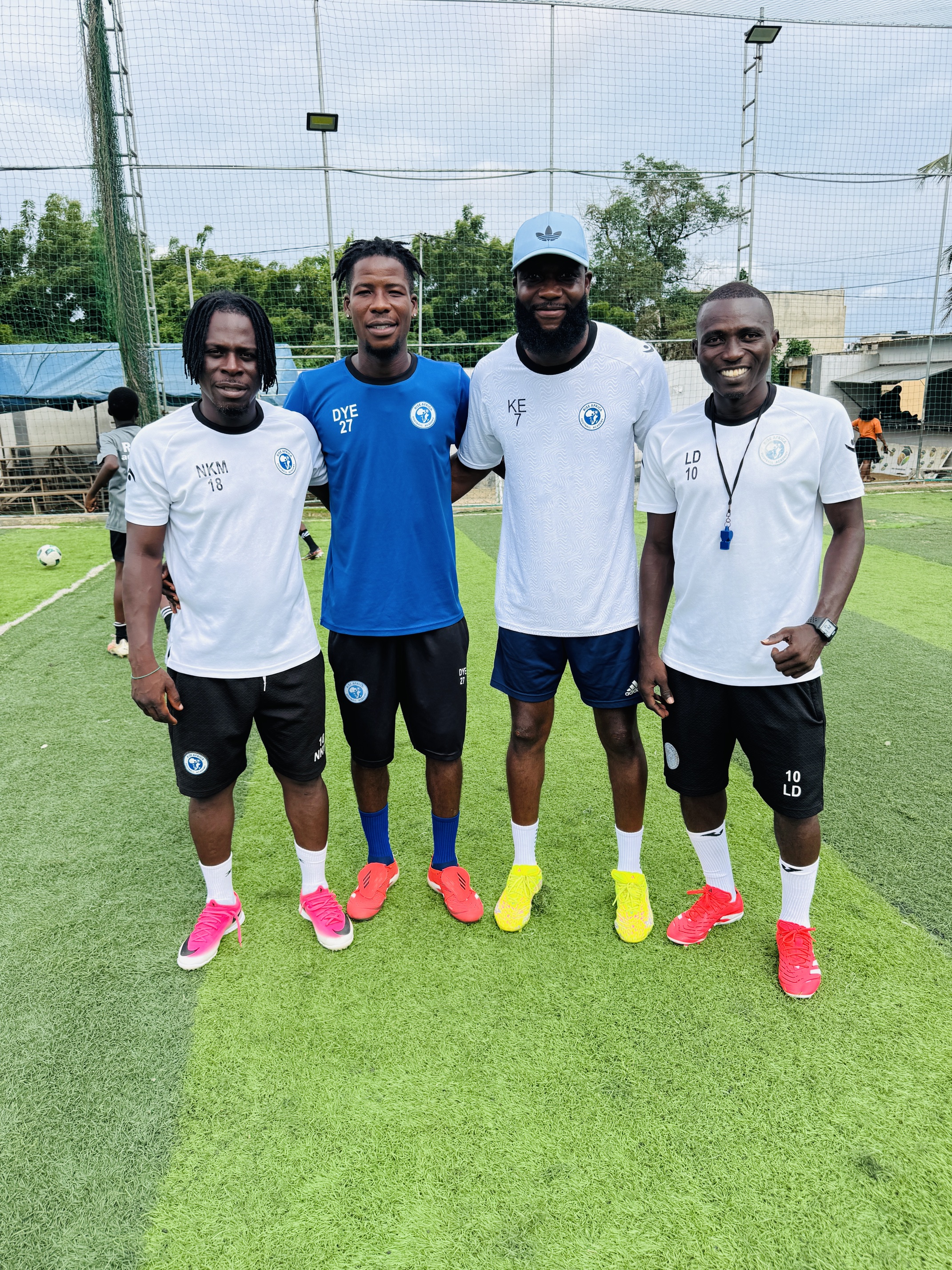 Four RAFA Academy coaches together on the pitch